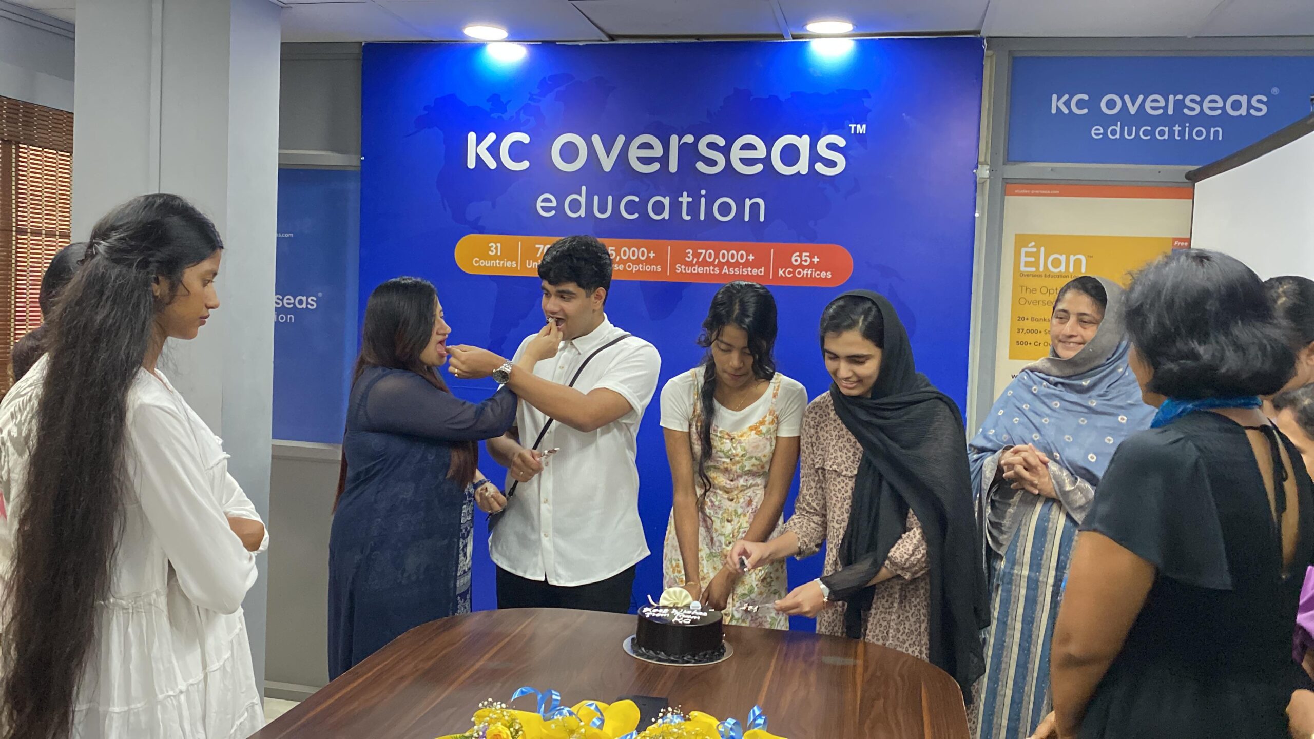 Students celebrating on receiving study abroad visa at KC calicut office